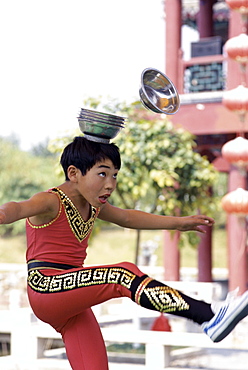 Child performing acrobatics, Shanghai, China, Asia