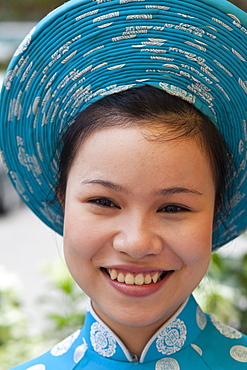 Girl in traditional costume, Hue, Vietnam, Indochina, Southeast Asia, Asia