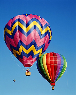 Colourful hot air balloons in blue sky, Albuquerque, New Mexico, United States of America, North America