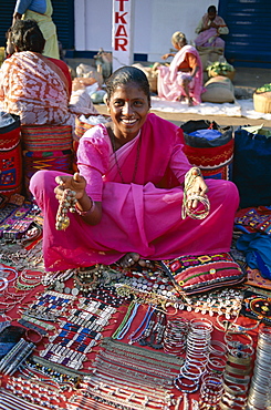 Vendor selling jewellery, Anjuna Market, Goa, India, Asia