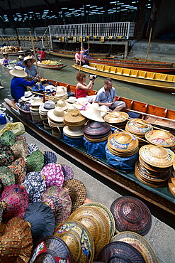 Tourists on canal boat tour, Floating market at Damnoen Saduak, Bangkok, Thailand, Southeast Asia, Asia