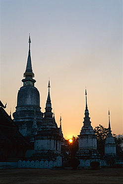 Chedis at sunset, Wat Suan Dok, Chiang Mai, Thailand, Southeast Asia, Asia