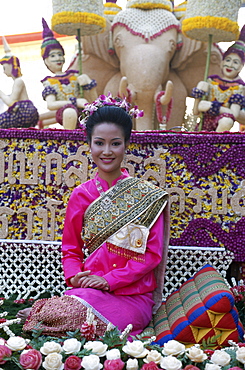 Woman dressed in traditional costume on a floral float, Flower Festival, Chiang Mai, Thailand, Southeast Asia, Asia