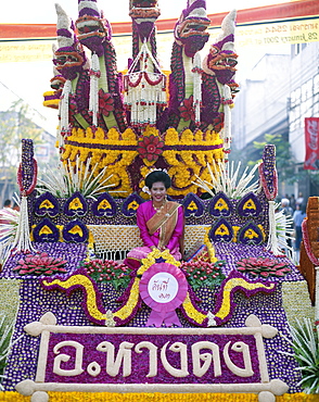 Woman dressed in traditional costume on a floral float, Flower Festival, Chiang Mai, Thailand, Southeast Asia, Asia