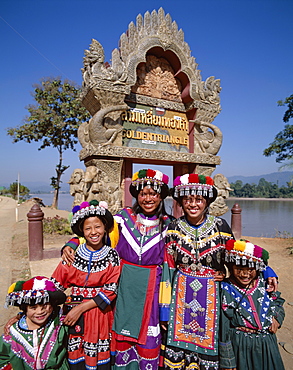 Women and children dressed in ethnic costume at Golden Triangle Gate, Golden Triangle, Thailand, Southeast Asia, Asia