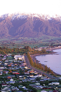 View over town and Seaward Kaikoura Mountain Ranges, Kaikoura, Canterbury, South Island, New Zealand, Pacific