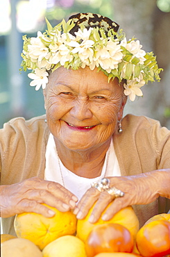 Elderly fruit vendor at Punanga Nui Market, Rarotonga, Cook Islands, Polynesia, South Pacific, Pacific