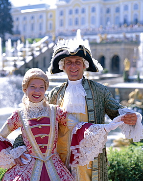 Couple dressed in period costume, Peterhof Palace (Petrodvorets Palace), St. Petersburg, Russia, Europe