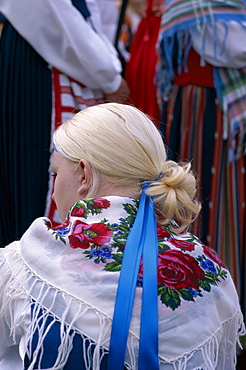 Back vew of blonde Swedish woman in traditional dress, Stockholm, Sweden, Scandinavia, Europe