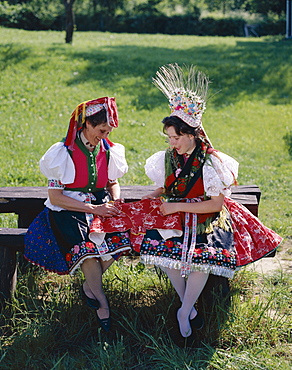 Women dressed in traditional folklore costume, Holloko, Hungary, Europe