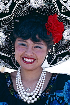 Woman wearing sombrero, Mexico City, Mexico, North America