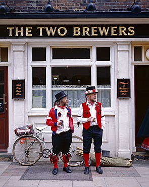 Two Morris Dancers drinking outside pub, Rochester, Kent, England, United Kingdom, Europe