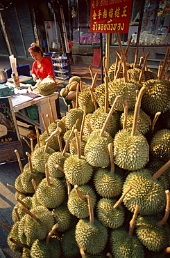 Woman street vendor selling durians, Bangkok, Thailand, Southeast Asia, Asia