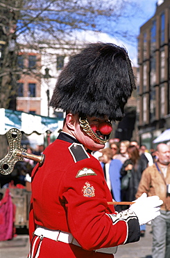 Street performer dressed as a guardsman, Covent Garden, London, England, United Kingdom, Europe