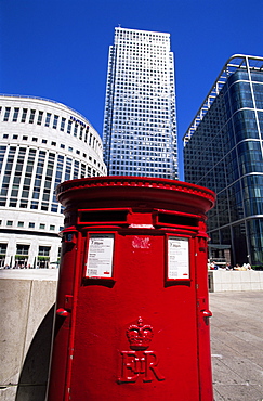 Traditional postbox and Canary Wharf skyline, Docklands, London, England, United Kingdom, Europe