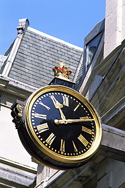 Clock in Lombard Street, City of London, London, United Kingdom, Europe