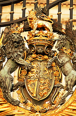 Detail of the Royal Coat of Arms on gate at Buckingham Palace, London, England, United Kingdom, Europe