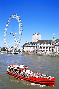 London Eye and River Thames with tour boat, London, England, United Kingdom, Europe