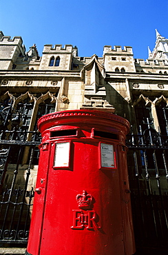 Traditional postbox and Westminster Abbey in the background, London, England, United Kingdom, Europe