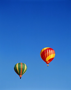 Colourful hot air balloons in blue sky, Albuquerque, New Mexico, United States of America, North America