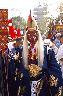 Man dressed in Tengu costume at Jidai Matsuri Festival held annually in November at Sensoji Temple, Asakusa, Tokyo, Japan, Asia