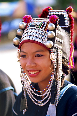 Akha hilltribe girl wearing traditional silver headpiece and costume, Chiang Rai, Golden Triangle, Thailand, Southeast Asia, Asia