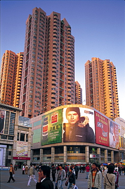 Shopping street and high rise apartments, Guangzhou, Guangdong Province, China, Asia