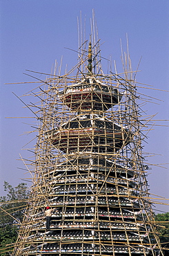 Pagoda covered in bamboo scaffolding undergoing renovation, Shenzhen, Guangdong Province, China, Asia