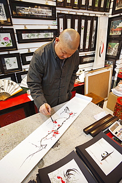 Artist painting, The Silk Market, Beijing, China, Asia