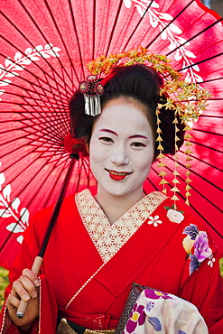 Portrait of Maiko (apprentice geisha) dressed in kimono, Gion, Kyoto, Japan, Asia