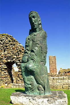 Cuthbert of Farne sculpture, Lindisfarne Priory, Holy Island, Northumbria, England, United Kingdom, Europe