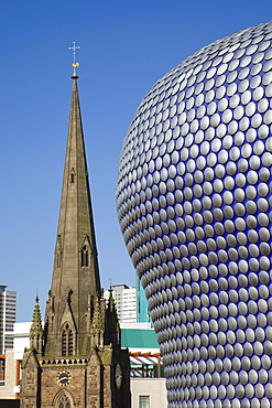 Selfridges Department Store designed by Future Systems and St. Martins Church spire, Bullring Shopping Mall, Birmingham, England, United Kingdom, Europe