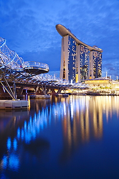 Marina Bay Sands Hotel and the Helix bridge at dusk in Singapore, Southeast Asia, Asia