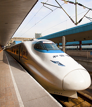 Engine of a Chinese high speed train parked at a railway station platform, Shanghai, China, Asia