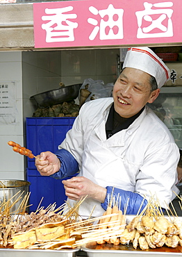 Snack vendor in family business, Chengdu, Sichuan Province, China, Asia