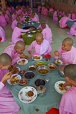 Nuns at lunch, Yangon (Rangoon), Myanmar (Burma), Asia