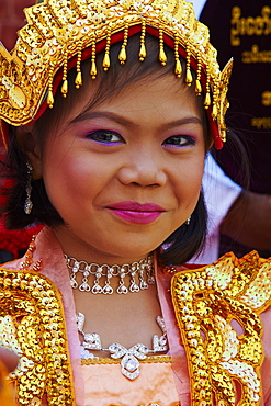 Young Burmese girl during ritual for becoming a nun, Paya Mahamuni, Mandalay, Myanmar (Burma), Asia