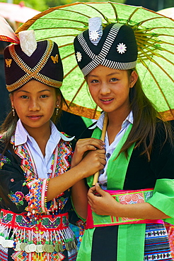 Young Hmong women in traditional dress, Lao New Year festival, Luang Prabang, Laos, Indochina, Southeast Asia, Asia