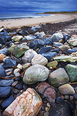 The beautiful coloured rocks at Howdiemont Sands, Northumberland, England, United Kingdom, Europe