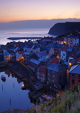 Dawn from Cowbar overlooking the beautiful village of Staithes, North Yorkshire, Yorkshire, England, United Kingdom, Europe