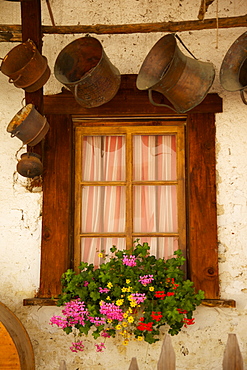 Shuttered windows and flowers, Corvara, Badia Valley, Bolzano Province, Trentino-Alto Adige/South Tyrol, Italian Dolomites, Italy, Europe