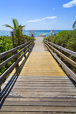 Boardwalk towards the beach and Atlantic Ocean, South Beach, Miami Beach, Miami, Florida, United States of America, North America