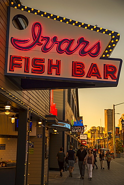 Neon Lights at Pier 54 during the golden hour before sunset, Alaskan Way, Downtown, Seattle, Washington State, United States of America, North America