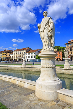 View of statues in Prato della Valle and colourful architecture visible in background, Padua, Veneto, Italy, Europe