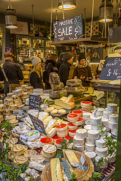 Various cheeses on a stall in Borough Market, Southwark, London, England, United Kingdom, Europe