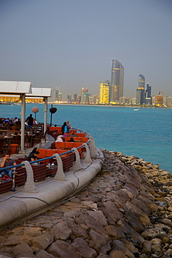 View of city from Marina Cafe at dusk, Abu Dhabi, United Arab Emirates, Middle East