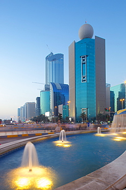 City skyline on Rashid Bin Saeed Al Maktoum Street at dusk, Abu Dhabi, United Arab Emirates, Middle East 