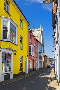 Cromer Parish Church of St. Peter and St. Paul and colourful houses on a summer day, Cromer, Norfolk, England, United Kingdom, Europe