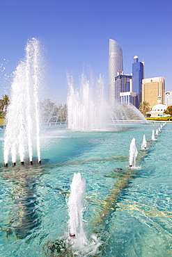 Contemporary architecture and Al Markaziyah Gardens and Fountain, Abu Dhabi, United Arab Emirates, Middle East