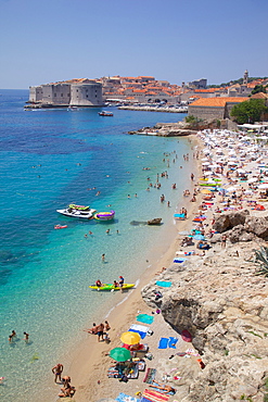 View of Old Town, UNESCO World Heritage Site, and Ploce Beach, Dubrovnik, Dalmatian Coast, Croatia, Europe